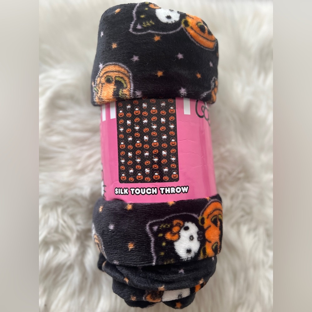 Hello Kitty black cat Halloween blanket. NEW